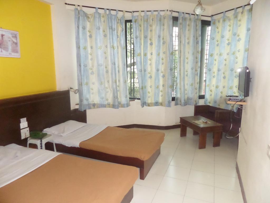 Hotel Manorath Nashik Δωμάτιο φωτογραφία